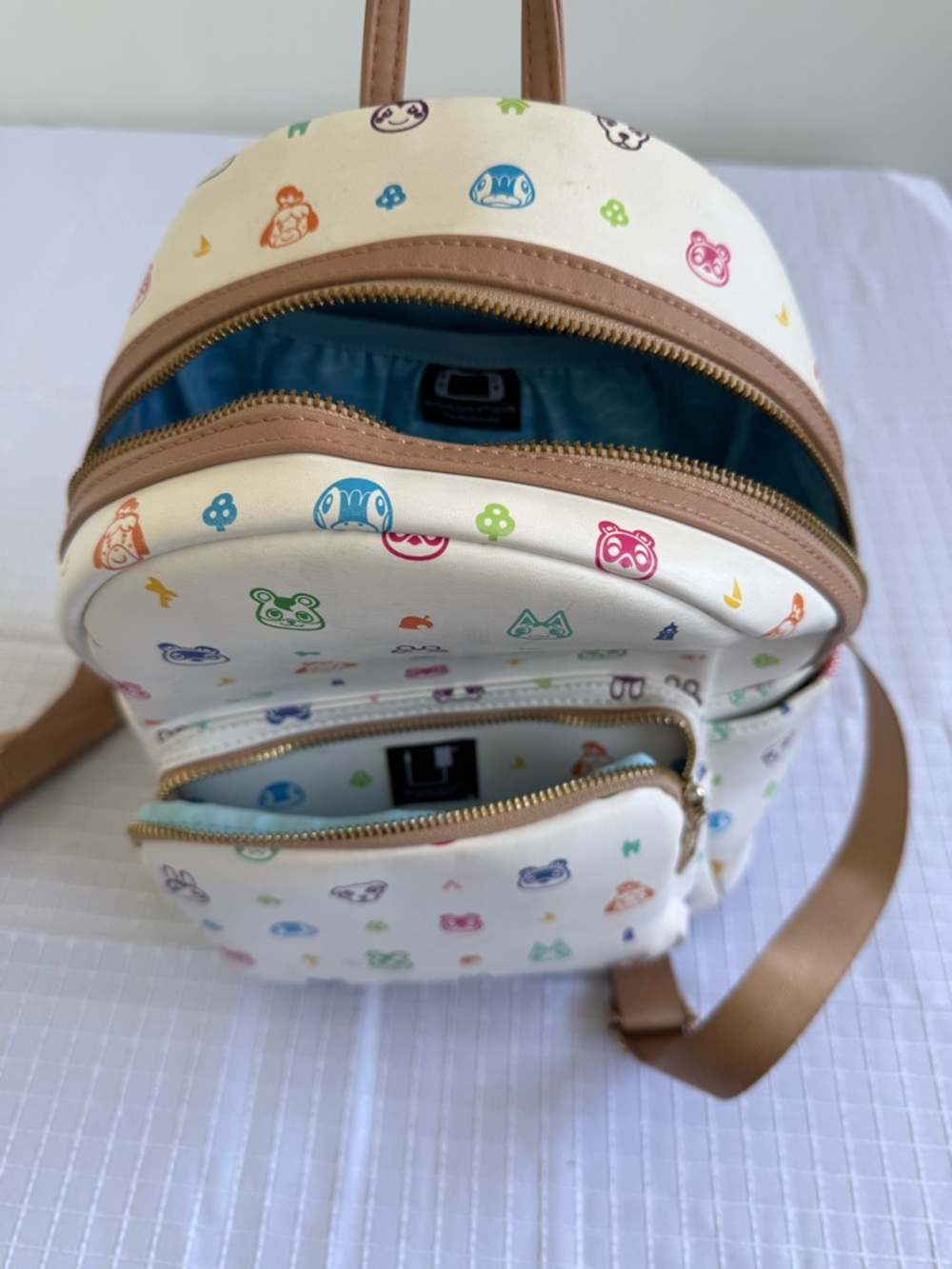 Nintendo Switch White Mini Backpack with Multicolor Animal Icons
